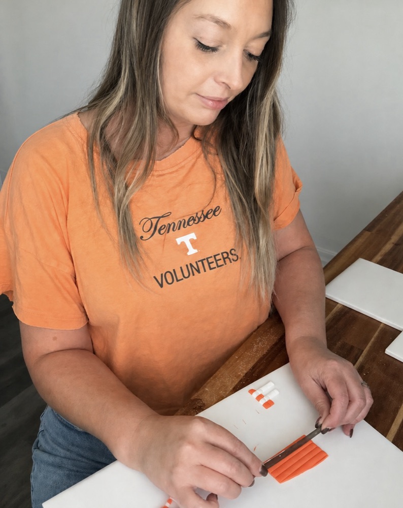 Lauryn Whitman at her workbench in Oak Ridge, Tennessee